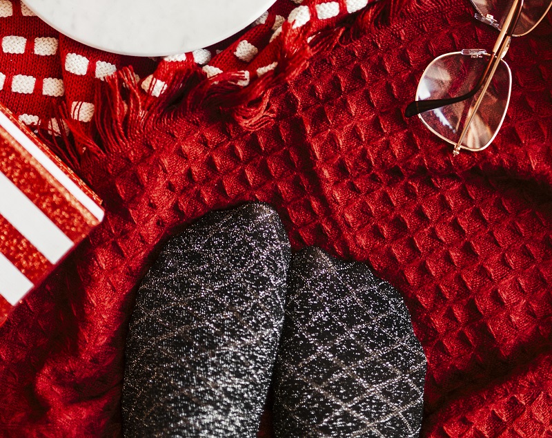 Mix of Texture Pair of silvery black socks on a Christmas holiday