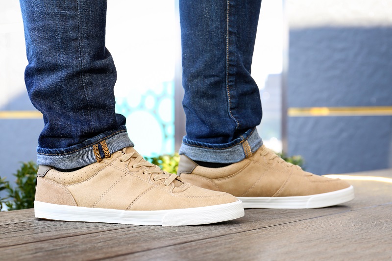 Sneakers: Fusion Done Right Stylish man in beige shoes outdoors